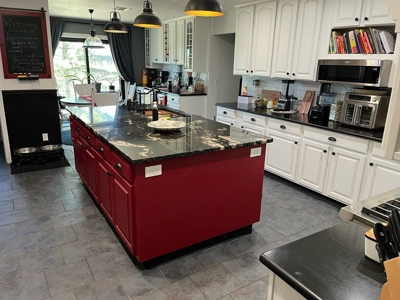 spacious home on 10.15 acres with meadows and a large garage - image 9