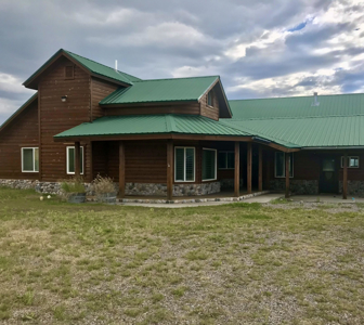 spacious home on 10.15 acres with meadows and a large garage - image 1