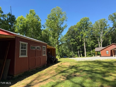 Log Cabin on 40.75 Acres In Unicoi County, Tennessee - image 14