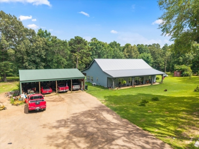Custom Wood Home on 14.51 Acres in Hughes Springs, TX - image 2