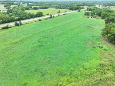 Excellent Investment 11.56+/- Acres w/ Highway Frontage & Pond - image 5
