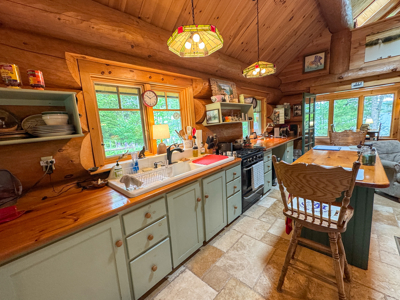 A Log Home Masterpiece in the Maine Woods on West Lake - image 14