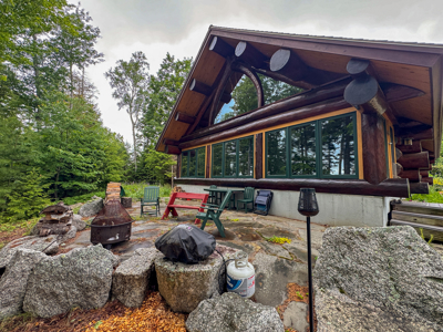 A Log Home Masterpiece in the Maine Woods on West Lake - image 4