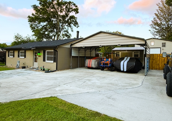 Block Home with Huge Garage, Storage, Paved & Covered Parking