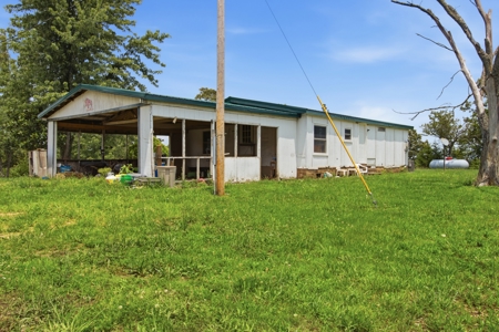 431 Acre Ozarks Farm with Springs, Ponds & Income Potential - image 16