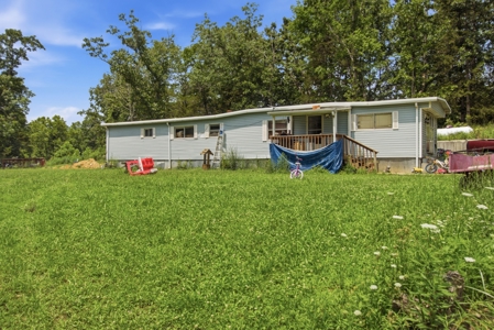 431 Acre Ozarks Farm with Springs, Ponds & Income Potential - image 17