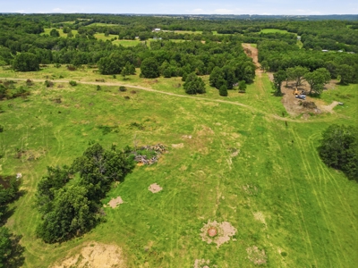 431 Acre Ozarks Farm with Springs, Ponds & Income Potential - image 5