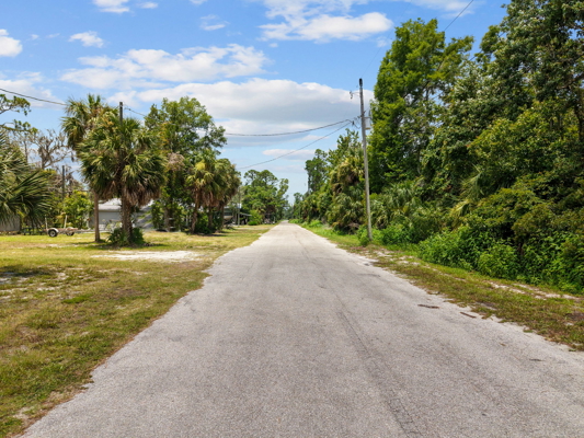 Canal-Front Opportunity With 3 Lots & Private Boat Ramp