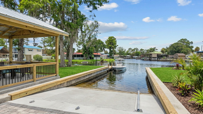 Canal-Front Opportunity With 3 Lots & Private Boat Ramp