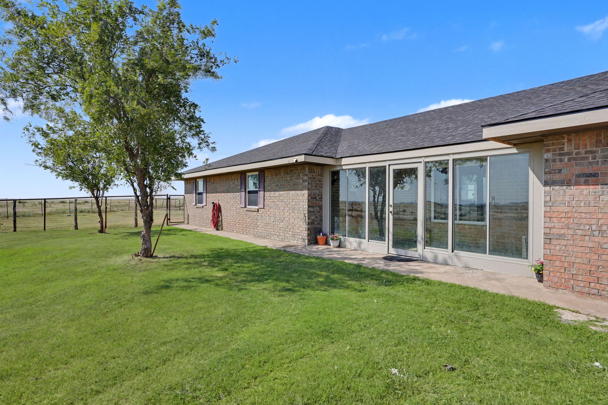 Home in the country on 2.61 ac with horse pens. House is 5 bedroom 2 bath 2 sun porches and spacious open concept living .