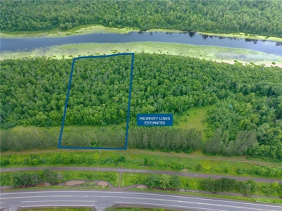 3+ Acres with 285' Frontage on the Moosehorn River in Moose Lake - image 2