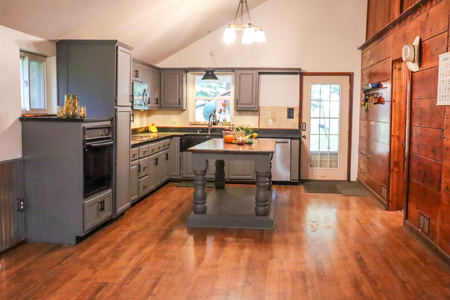 Close to Smithville Lake, this Barndominium has a story to tell - image 27
