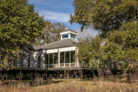Contemporary Home on  Wooded Acres with Pond - image 2