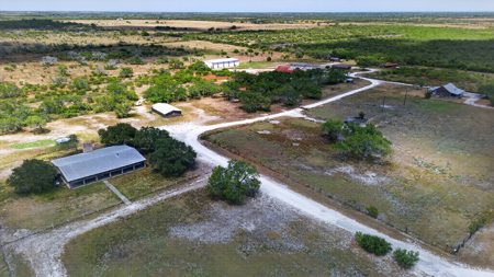 Turnkey 180+ Acre Ranch on US 281 with 4 Homes & Income - image 4