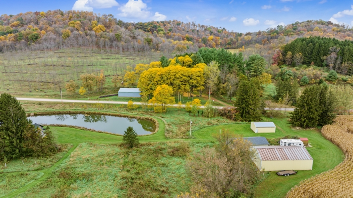 95.02-Acre Premier Whitetail Hunting Estate with Log Cabin, Pond