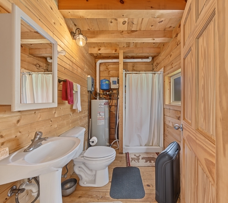 95.02-Acre Premier Whitetail Hunting Estate with Log Cabin, Pond