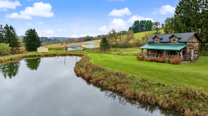 95.02-Acre Premier Whitetail Hunting Estate with Log Cabin, Pond