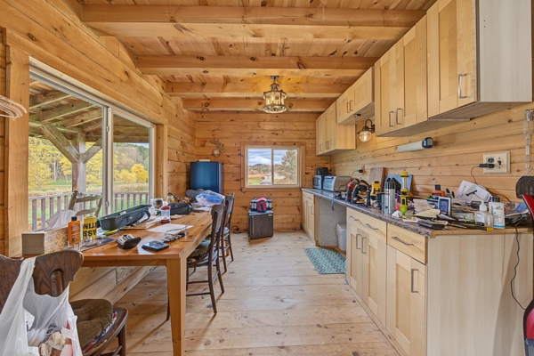 95.02-Acre Premier Whitetail Hunting Estate with Log Cabin, Pond