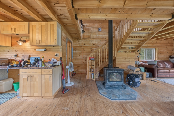95.02-Acre Premier Whitetail Hunting Estate with Log Cabin, Pond