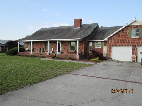 Brick Ranch Home In A Country Setting