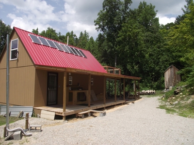 Private Solar Cabin In The Woods For Sale In Tn With Acreage - image 2