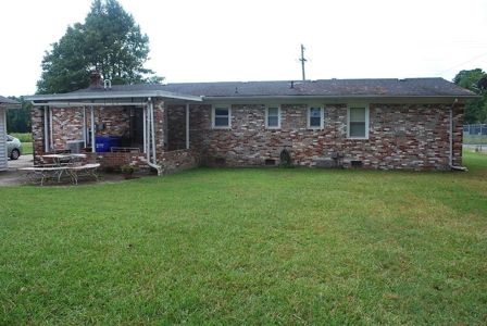 Brick Ranch home for sale at auction on .62 acre lot - image 1