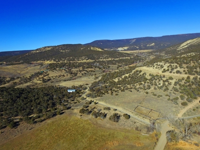 Vacant land has shop building, irrigation, borders BLM lands - image 5