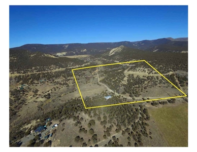 Vacant land has shop building, irrigation, borders BLM lands - image 1