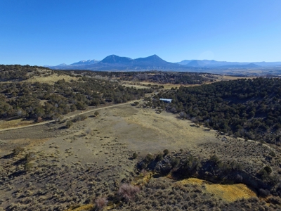 Vacant land has shop building, irrigation, borders BLM lands - image 3