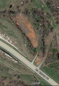 4+/- Acres of Hwy 412 frontage prime for development. - image 2