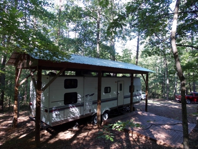 Wooded Lot with Camper Near Philpott Lake in Ferrum VA - image 1