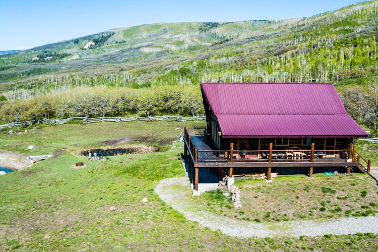 Image showcasing Colorado off-grid mountain log cabin w/ NF Access